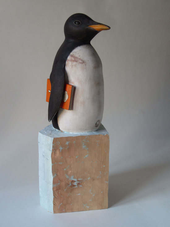 wood sculpture by guido pigni penguin